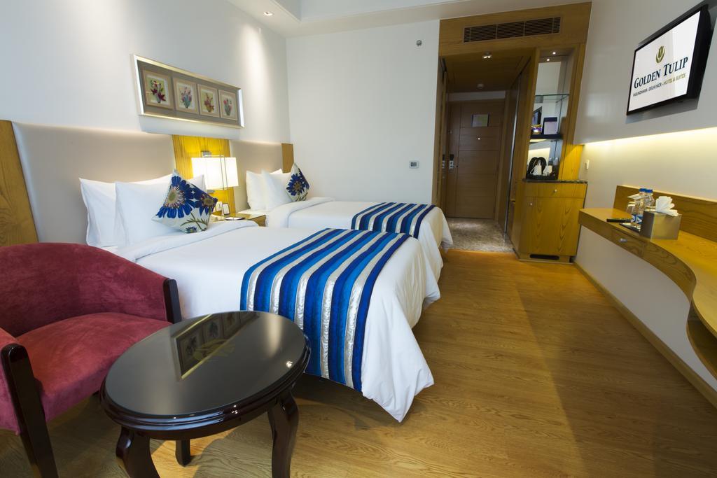 Golden Tulip Vasundhara Hotel y Suites Ghaziabad Habitación foto