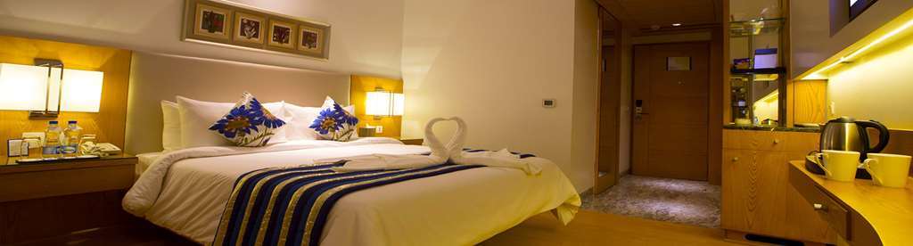 Golden Tulip Vasundhara Hotel y Suites Ghaziabad Habitación foto