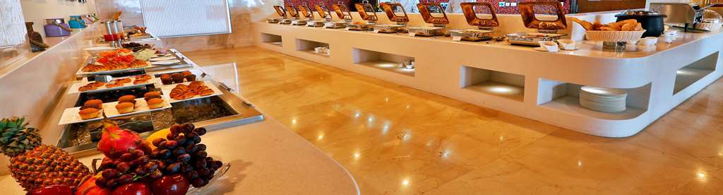 Golden Tulip Vasundhara Hotel y Suites Ghaziabad Restaurante foto